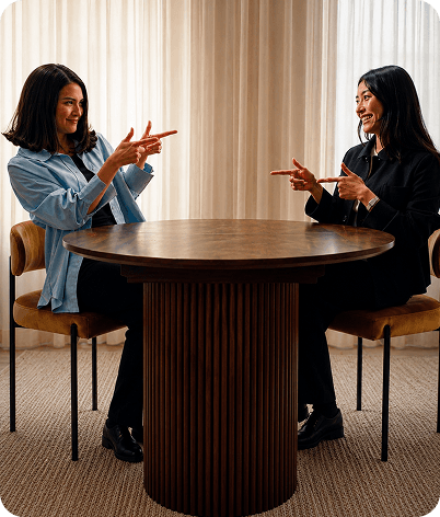 Healthcare professional speaking with a colleague